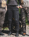 three women of difference sizes demonstrating the motorcycle cargo pants in different colous