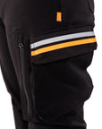 Black pants with reflective stripes on a white background