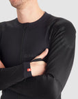 a man wearing Pando Moto black base layer shirt