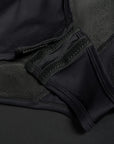 crotch closure on a black motorcycle body suit from Pando Moto