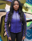 a black woman wearing purple motorcycle leather jacket for women with front zipper