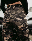 A woman's bottom wearing camouflage motorcycle cargo pants from Moto Girl