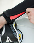 A close up of a zipper on Women's racing suit MIURA RS in black, white and fluo from Shima