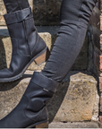 Woman's legs wearing black women's motorcycle boots from Falco
