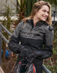 a smilling woman wearing grey motorcycle jacket SHIMA