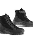 Pair of black tactical boots on a white background