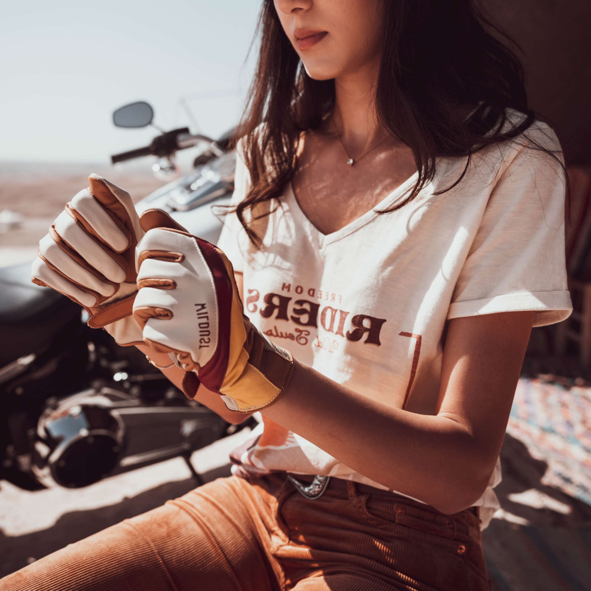 a woman wearing colourful leather motorcycle lady gloves from Wildust