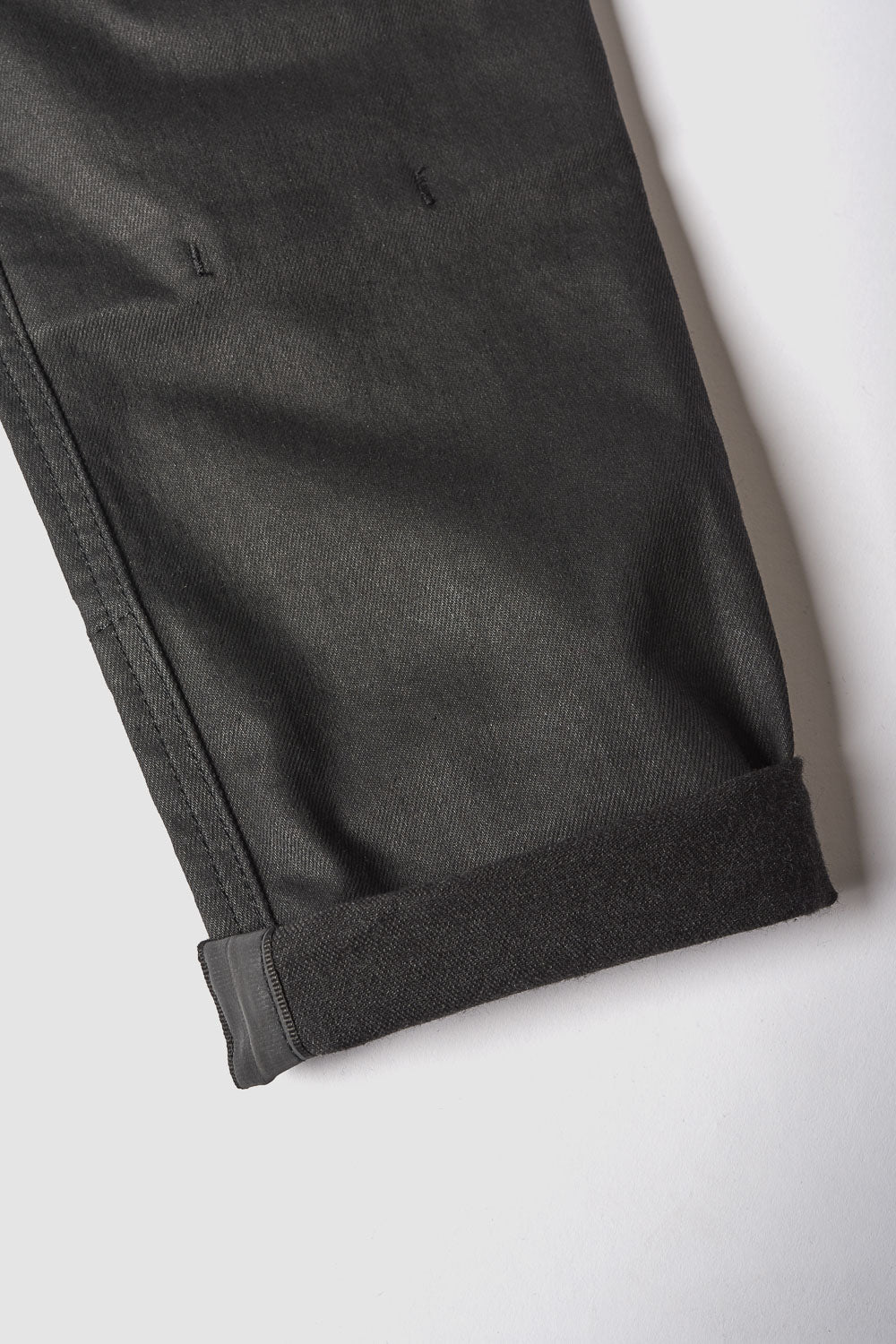 Dark gray pants on a white background