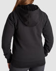 Woman standing with her back showing, wearing a Black Motorcycle Hoodie from Pando Moto 