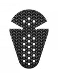 A black carbon fiber textured pad with a star-pattern weave and circular cutouts, shown on a solid white background.