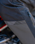 A close up of leg zipper on the women motorcycle touring pants