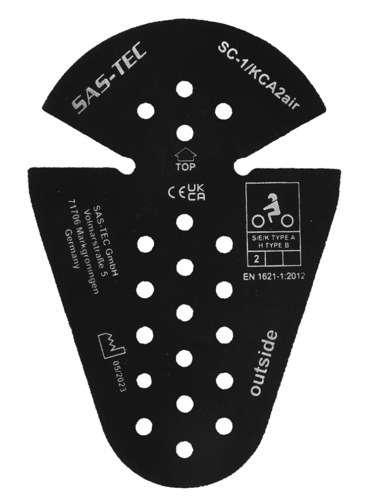 Black SAS-TEC bicycle fuel tank gasket with white printed text, certification marks, and ventilation holes on a white background.