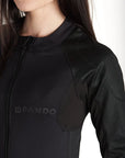 close up of a woman wearing black tight motorcycle underwear with Pando Moto Logo