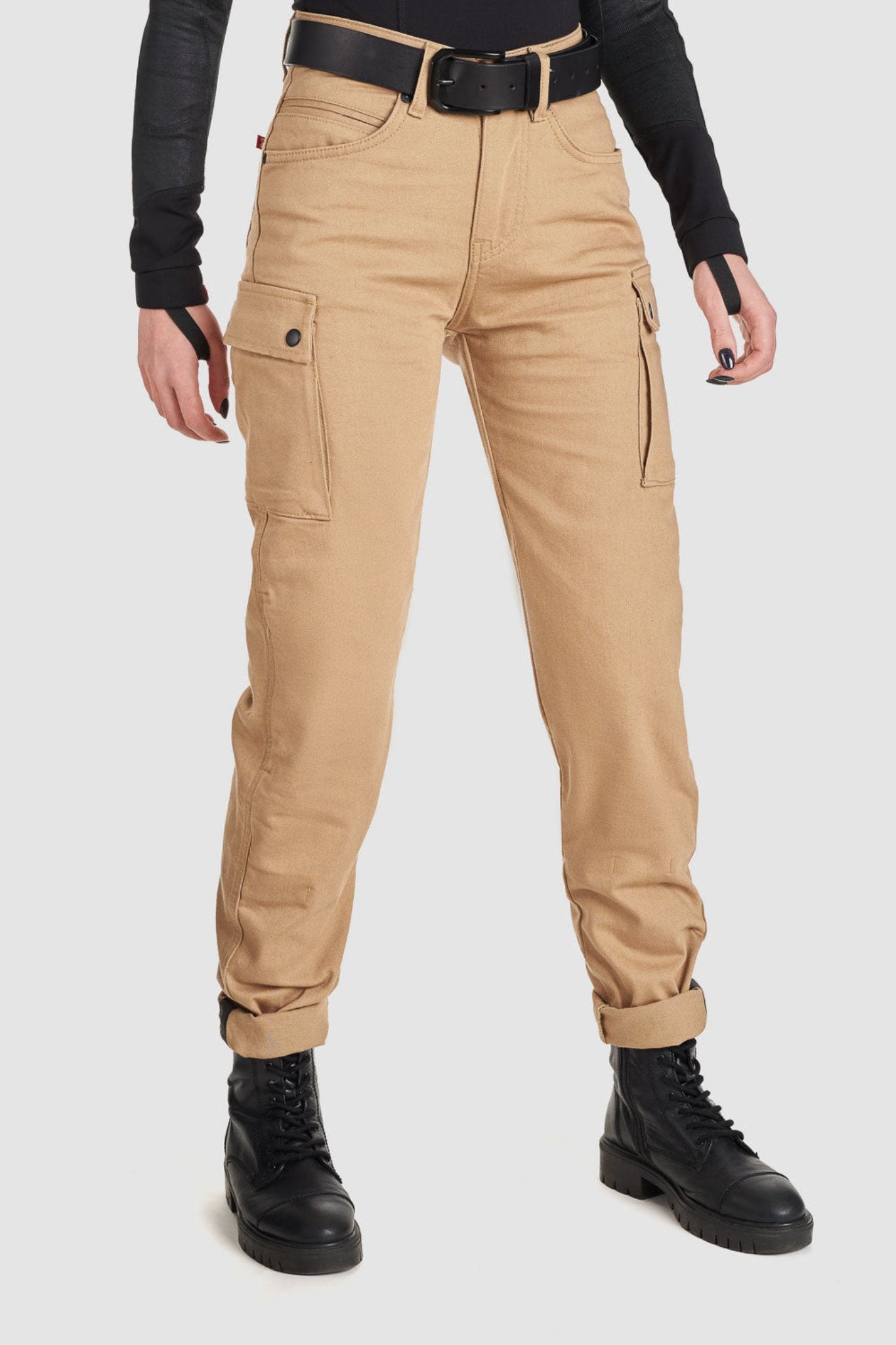 woman's lower body wearing beige mc cargo pants for ladies from pando moto 