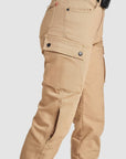 A close-up of the cargo pocket on the beige women's MC pants from the side.