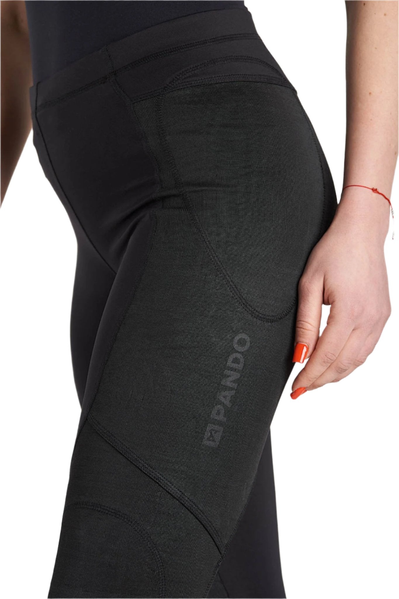 Woman's legs wearing armoured motorcycle leggings from Pando Moto