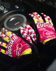 Ride like a Girl pink, black and yellow women's motorcycle gloves from eudoxie on the motorcycle's gas tank